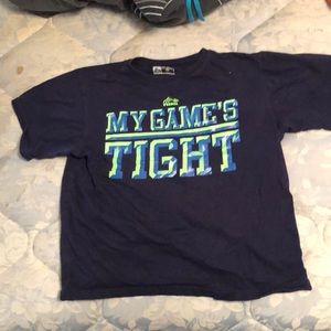 Navy blue t-shirt with “my games tight” on it